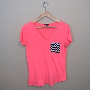 A bright pink t-shirt